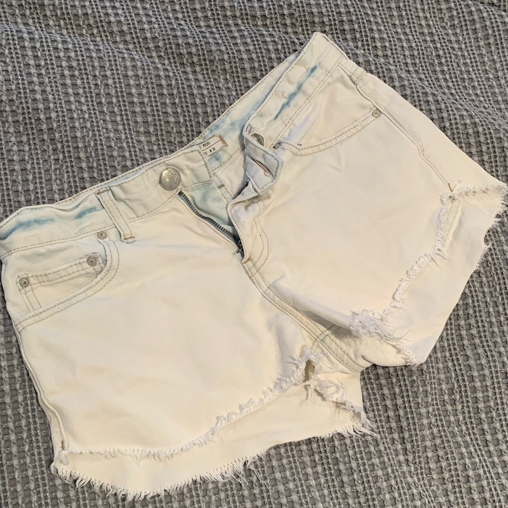Free people acid wash distressed denim shorts